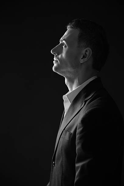 istock photo of a pensive man looking up 485878095