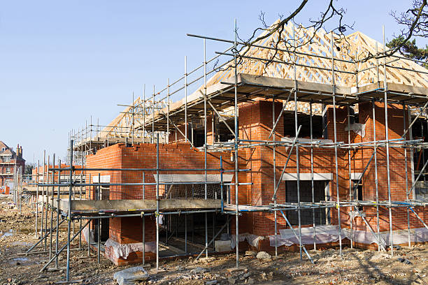 istock New houses under construction on a building site 485878147