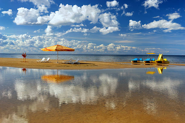 istock Hammock with an umbrella and chair on the beach 485879310