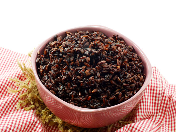 istock rice berry in bowl on white background 485879772