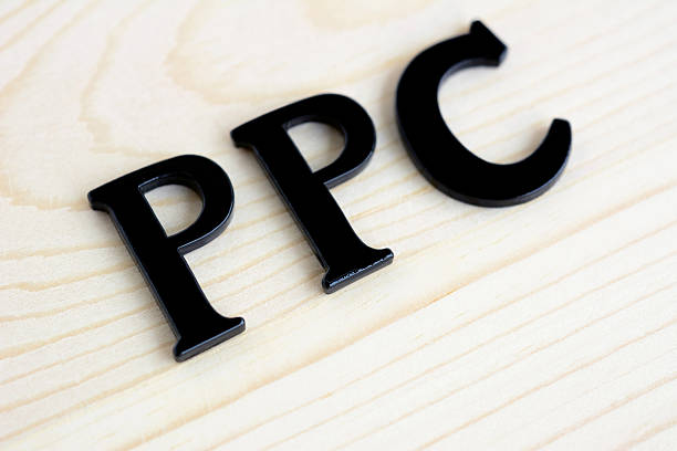 istock PPC (or Pay Per Click) sign on wood background 485880620