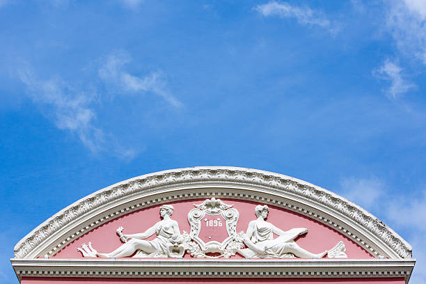 Roof Details from the Amazon Theatre (Portuguese: Teatro Amazonas) with blue cloudy sky, opera house located in Manaus, Amazonas Brazil