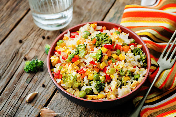 istock broccoli carrots corn green peas red pepper rice 485881852
