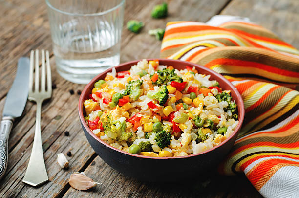 istock broccoli carrots corn green peas red pepper rice 485881904