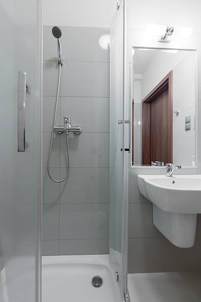 Toilet interior with shower cubicle Picture of toilet interior with shower cubicle guest bathroom stock pictures, royalty-free photos & images
