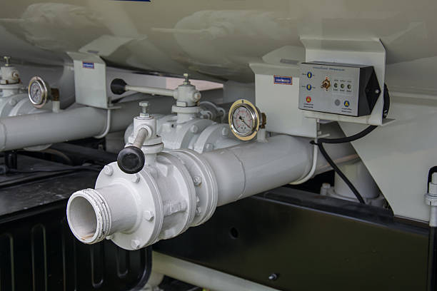 istock water valves at the rear of a fire engine 485883408