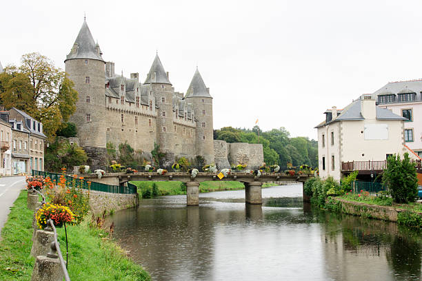 Chateau of Josselin Josselin, France - October 01, 2012: The Chateau of Josselin, Brittany, France. Josselin Castle is a medieval castle at Josselin, in the Morbihan department of Brittany, France, first built in the 11th century and rebuilt at various times since.  brest brittany photos stock pictures, royalty-free photos & images