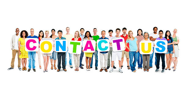 istock Multi-Ethnic Group Of People Holding Cardboards Forming Contact us 485884323