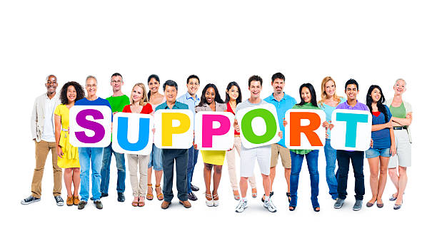istock Multi-Ethnic Group Of People Holding Cardboards Forming Support 485884333