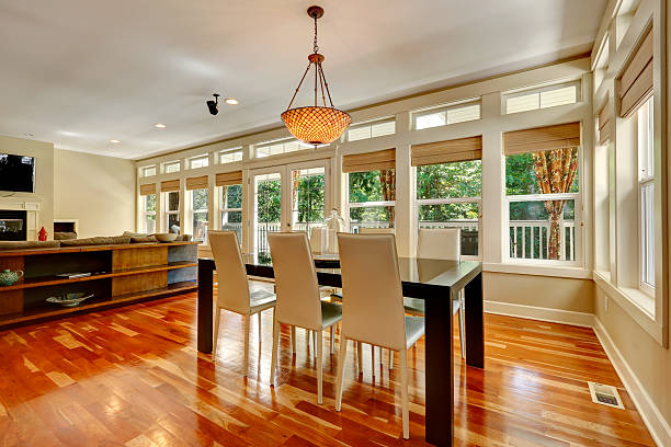 istock Elegant dining table set in spacious living room 485885191