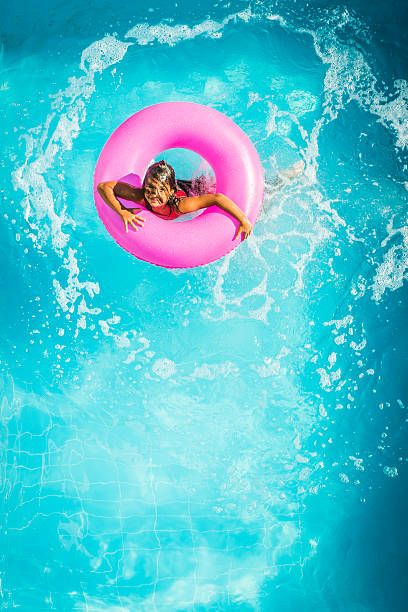 istock Little girl swimming 485886021