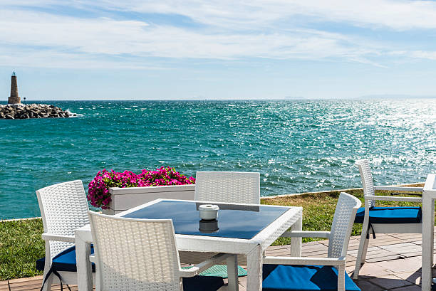 A seaside restaurant with beautiful  viewA seaside restaurant with beautiful  viewcaribbean sunrise from a seaside restaurant