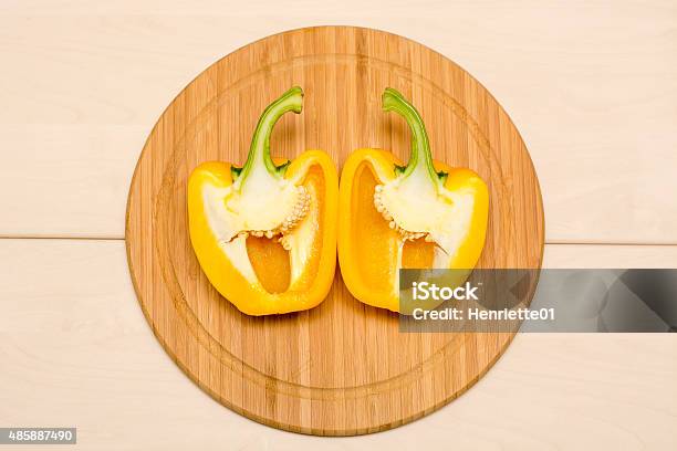 Yellow Bellpepper In Two Halves Stock Photo - Download Image Now - 2015, Beauty, Bell Pepper