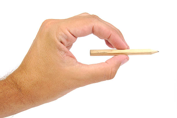 istock Image of human hand with pencil isolated on a white 485888084