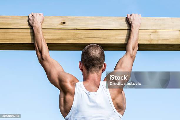 Athlete Doing Pullup Stock Photo - Download Image Now - 2015, Abdominal Muscle, Achievement