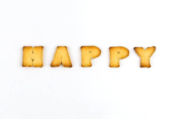 Happy wording by a b c biscuit stock photo