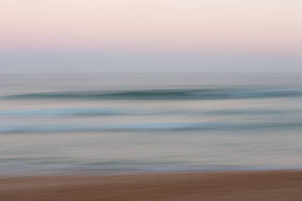 istock Abstract sunrise ocean background with blurred panning motion 485890356