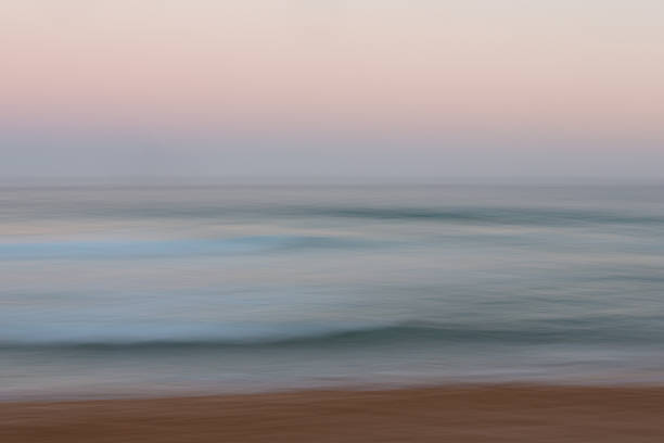 istock Abstract sunrise ocean background with blurred panning motion 485890904
