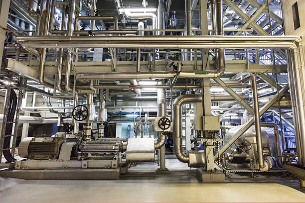Cogeneration plant Modern medium-power cogeneration plant piping hot stock pictures, royalty-free photos & images