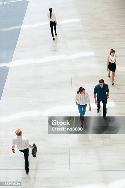 Young Business People Before Starting Work Stock Photo - Download Image Now - High Angle View, People, Walking