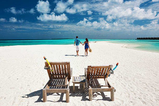 istock Couple running on a beach at Maldives 485895409
