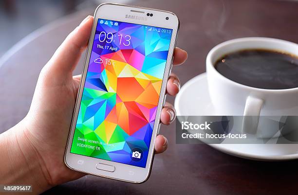 Android On Samsung Galaxy S5 Smart Phone Stock Photo - Download Image Now - Smart Phone, Icon Symbol, Samsung