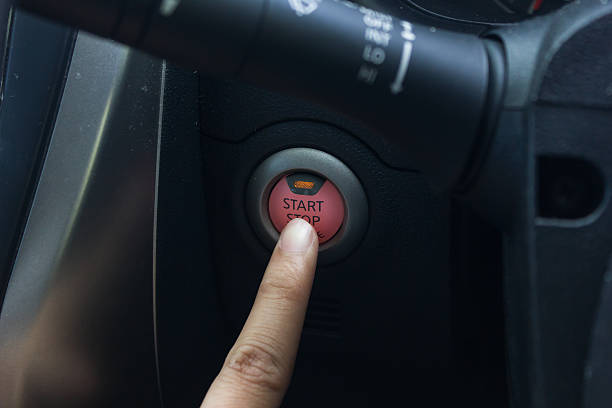 istock man hand use the signal switch. Car interior detail. 485895676