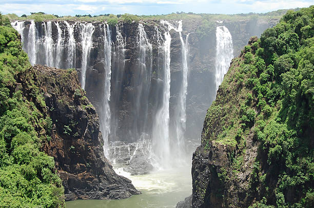 ザンビア/ジンバブエ - victoria falls waterfall zimbabwe zambia ストックフォトと画像