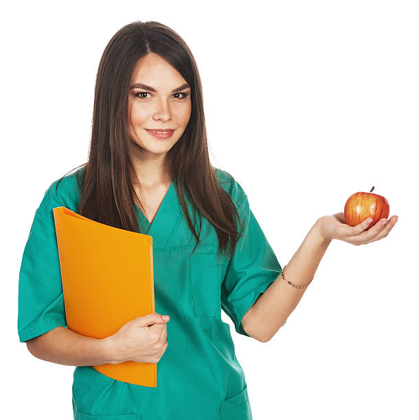 istock Female doctor holding an apple 485895979