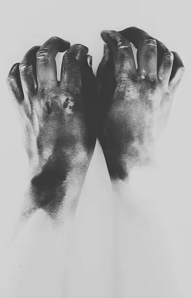 Photo of Charcoal Blackened Hands