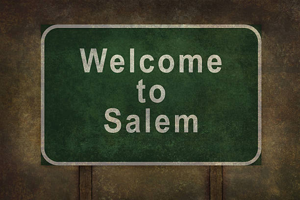Welcome to Salem roadside sign, with distressed ominous background Welcome to Salem road sign illustration, with distressed foreboding background salem massachusetts stock pictures, royalty-free photos & images