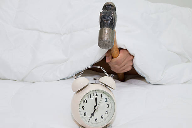 600+ Angry Man In Bed With Alarm Clock Stock Photos ...