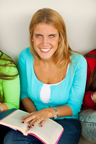 istock Young Woman with Books 485898725