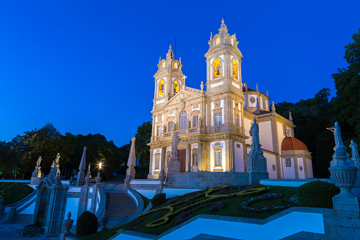 Bom Jesus do Monte in Braga Portugal seen in the evening illuminated seen from the right. This is a popular tourist attraction in Braga.