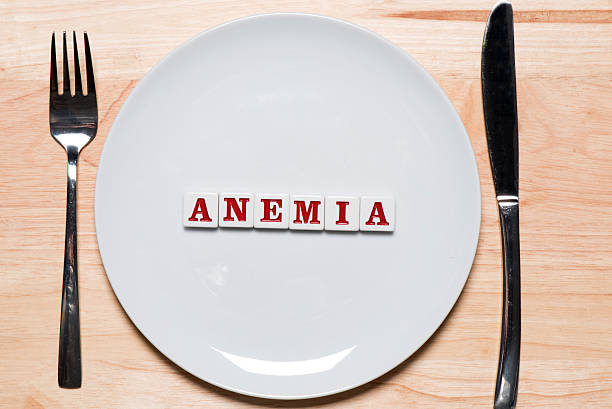 Anemia - healthy eating concept Anemia spelled out on a plate - healthy eating concept - studio shot anemia photos stock pictures, royalty-free photos & images