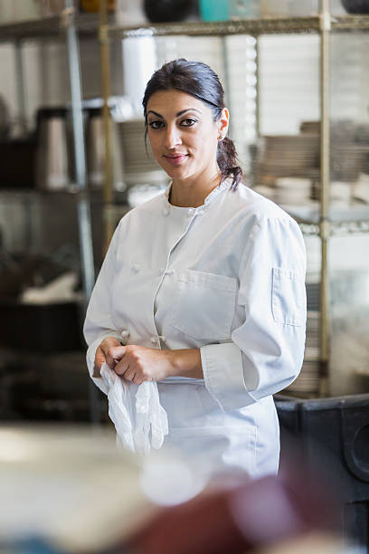 istock Woman working in commercial kitchen 485904914