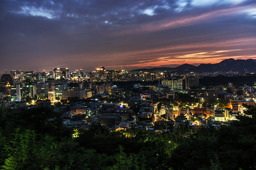 Naksan Park sunset and night view over Seoul city. Naksan Park is near hyehwa station in daehangno, seoul, south korea.