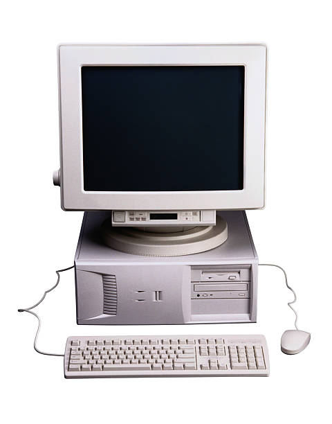 Old Desktop computer with monitor, keyboard and mouse stock photo