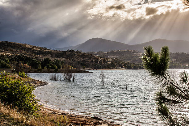 istock Sun Rays shining through clouds at Lake Jindabyne, 485922033