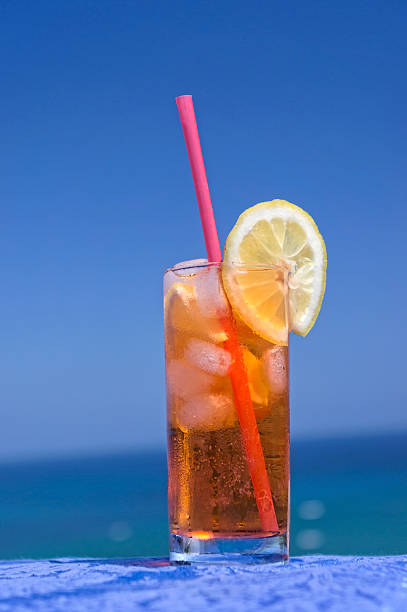 istock Cocktail drink in front of summer sea 485922784