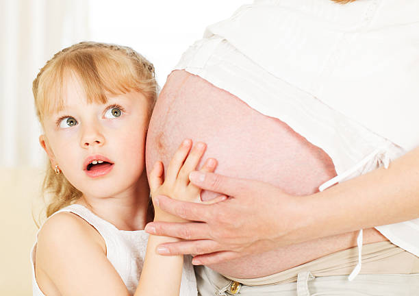 istock Mother's pregnant belly. 485922811