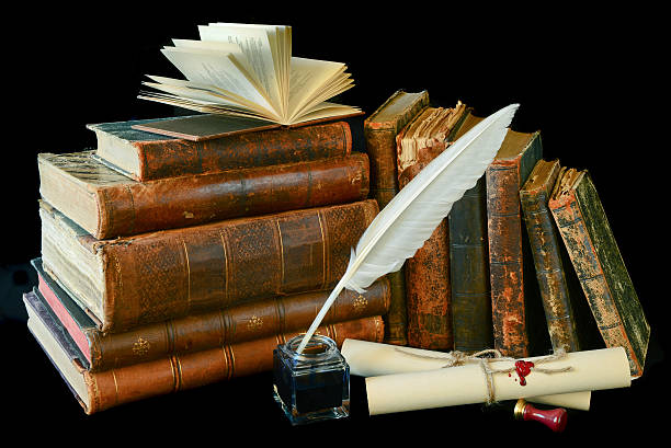 istock Vintage writing instruments and old books 485923563