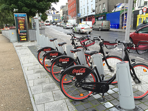 Galway, Ireland - July 27, 2015: Commuters in Galway, Ireland can choose to ride these bicycles in Galway's bike sharing program.