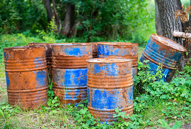 istock old rusty painted barrels outdoors 485924511