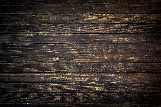 istock Weathered dark wooden board flooring 485924799