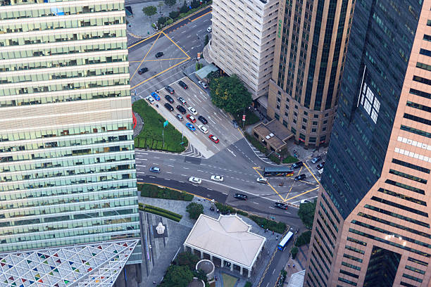 istock View downwards to the streets between skyscrapers in Singapore 485925250