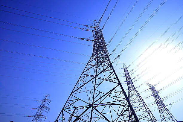 istock High-voltage power transmission towers 485925288