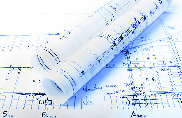 Architecture rolls architectural plans project architect blueprints real estate concept stock photo