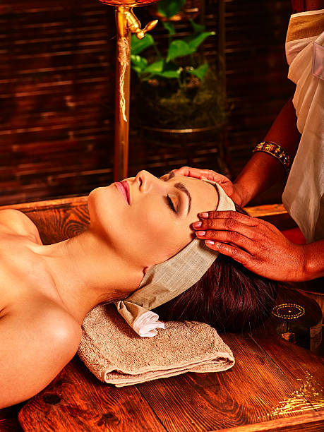istock Woman having Ayurvedic spa treatment 485930208