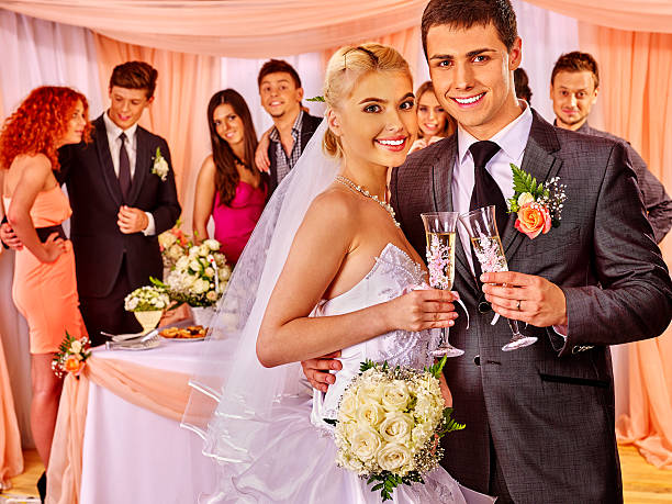istock Wedding couple drinking champagne 485932262